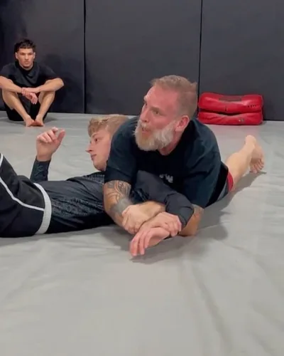 Matt Bryers teaching a position on the mat