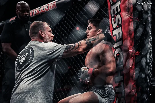A coach giving direction between rounds