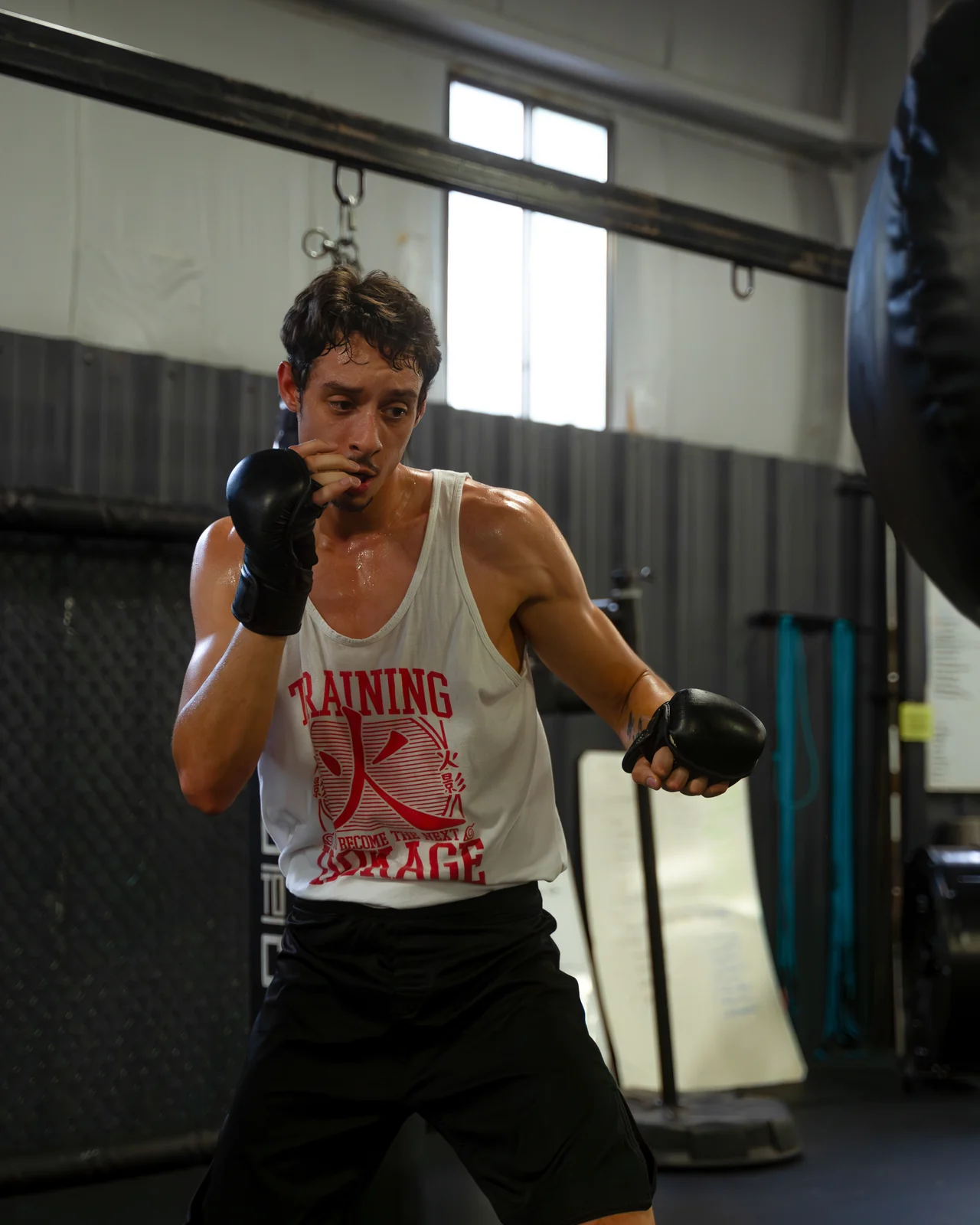 A student practicing striking on a bag