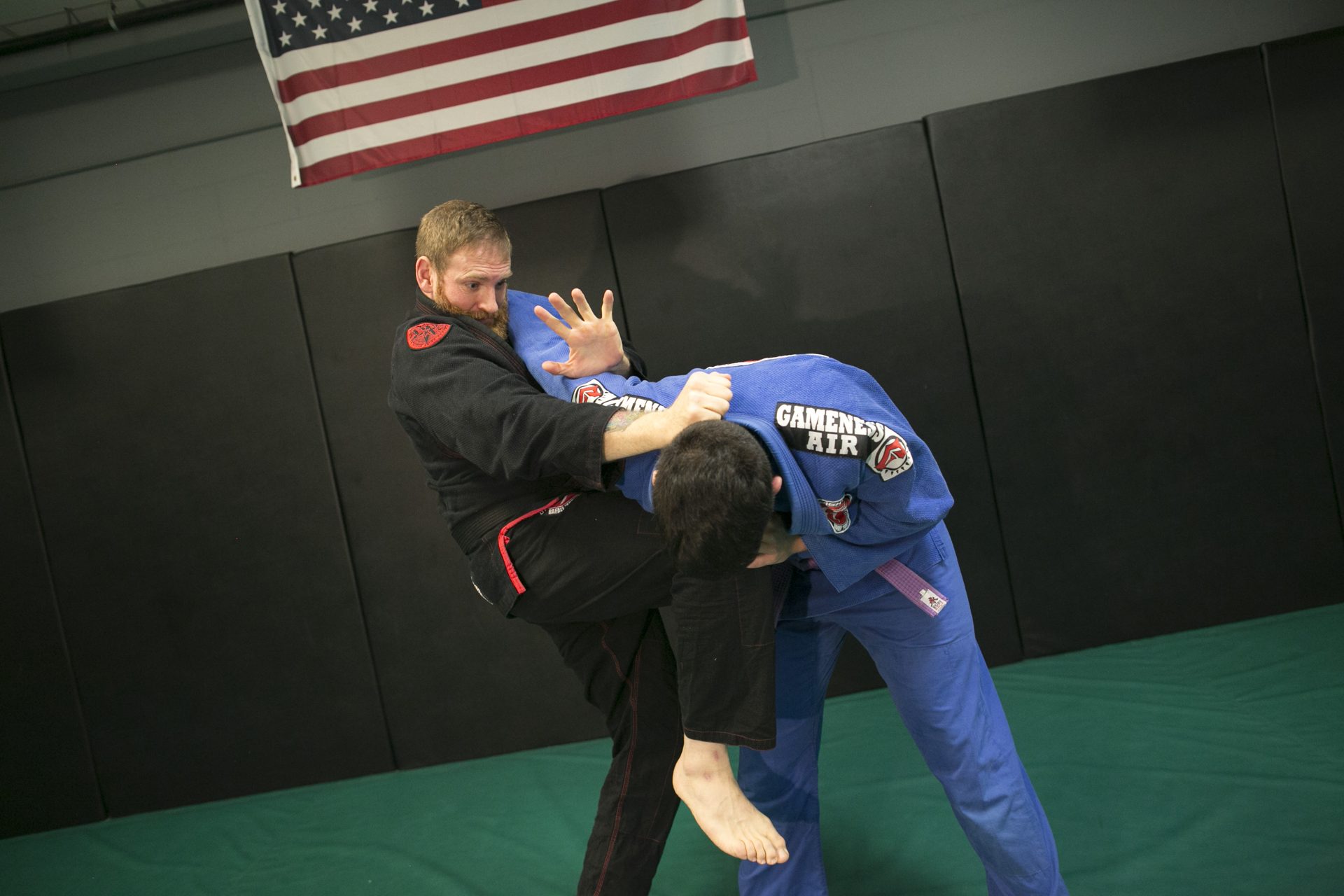 Matt Bryers catching a kick and countering with a palm to the face during gi training