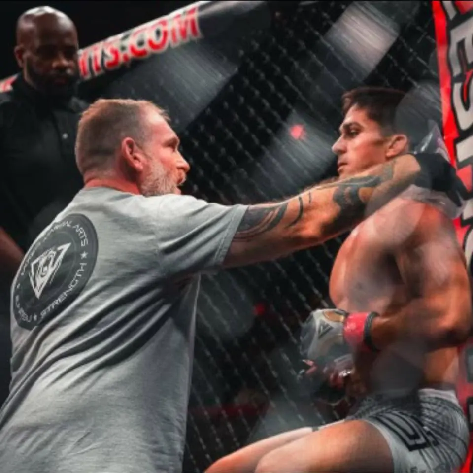 Matt Bryers cornering a TRITAC fighter in the cage