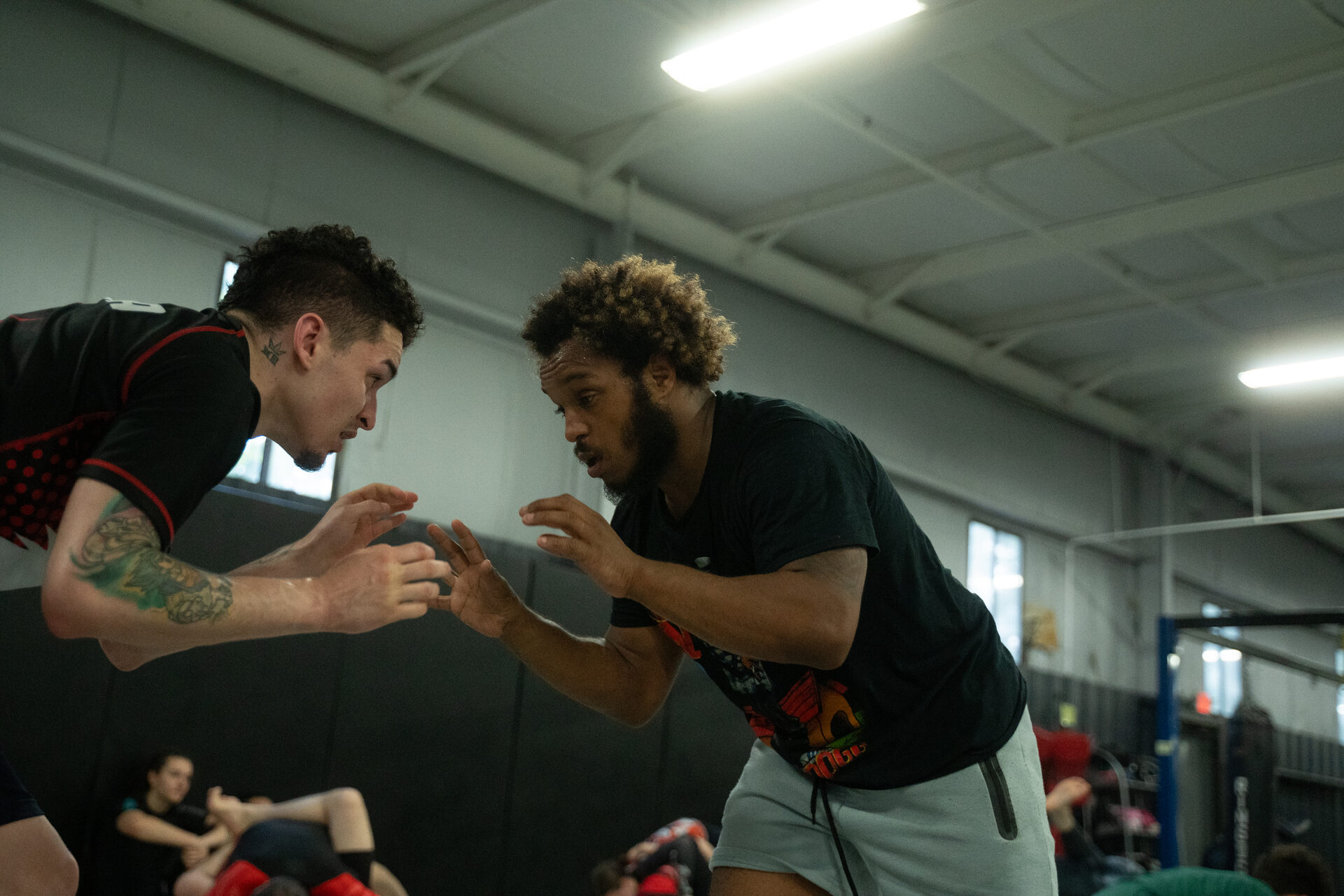 Two training partners hand fighting on the feet