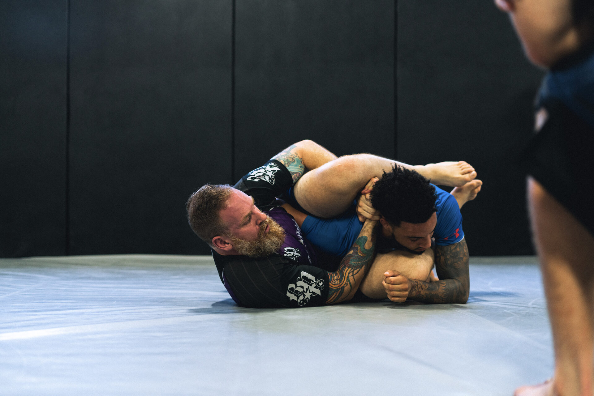 A submission locked on from the ground during no-gi grappling
